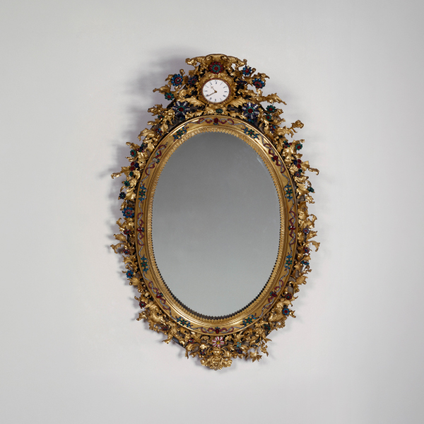 Hanging mirror with a clock