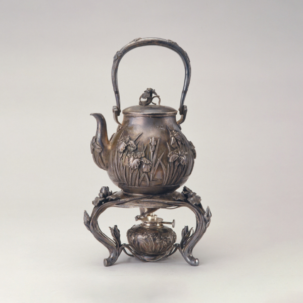 Iris-decorated kettle with handle