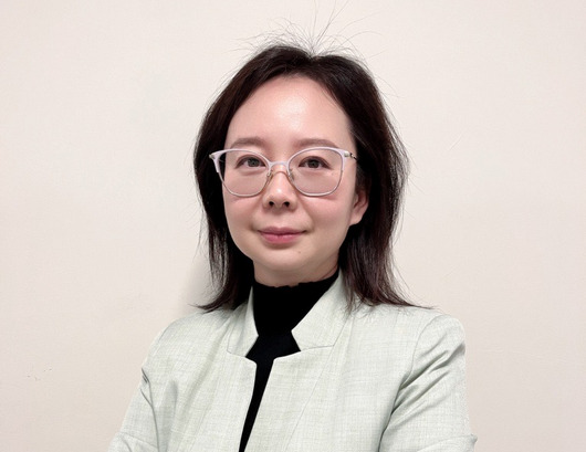梁嘉放女士