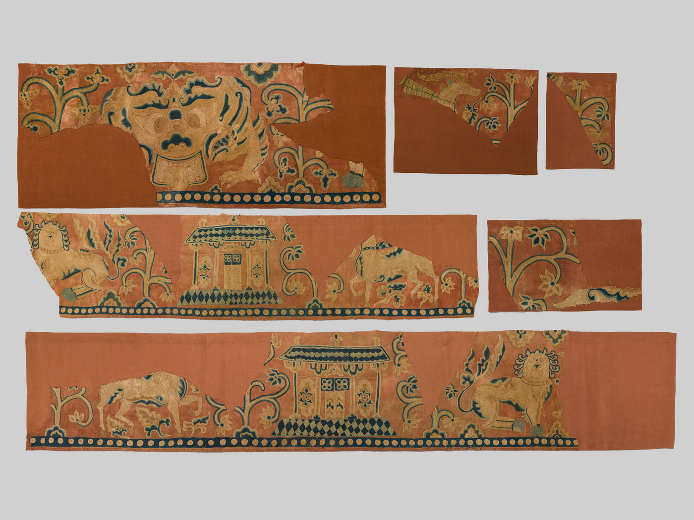 Pieces with animals, buildings, plants, and pearl border