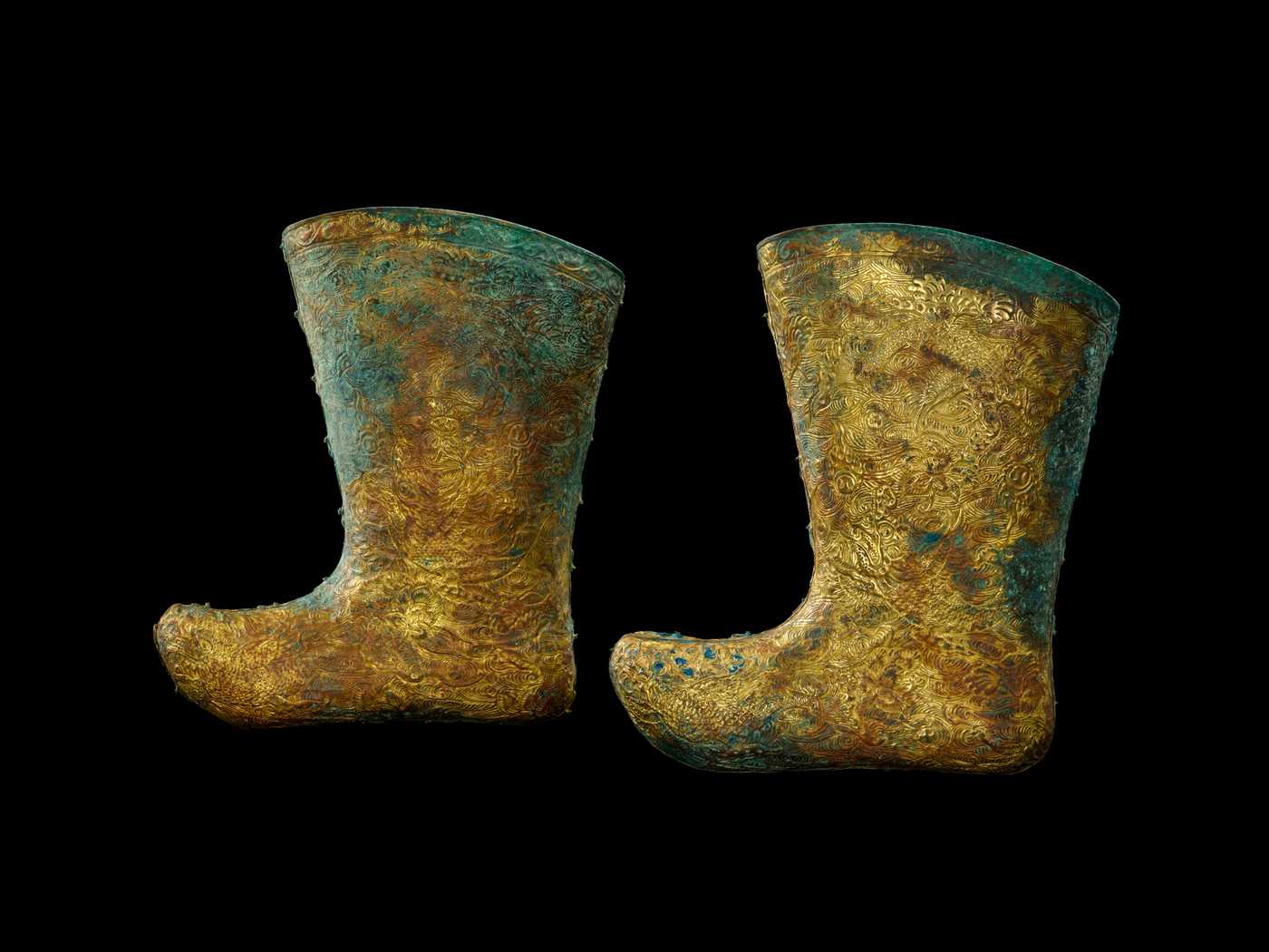 Boots with makaras chasing pearls in a lotus ground