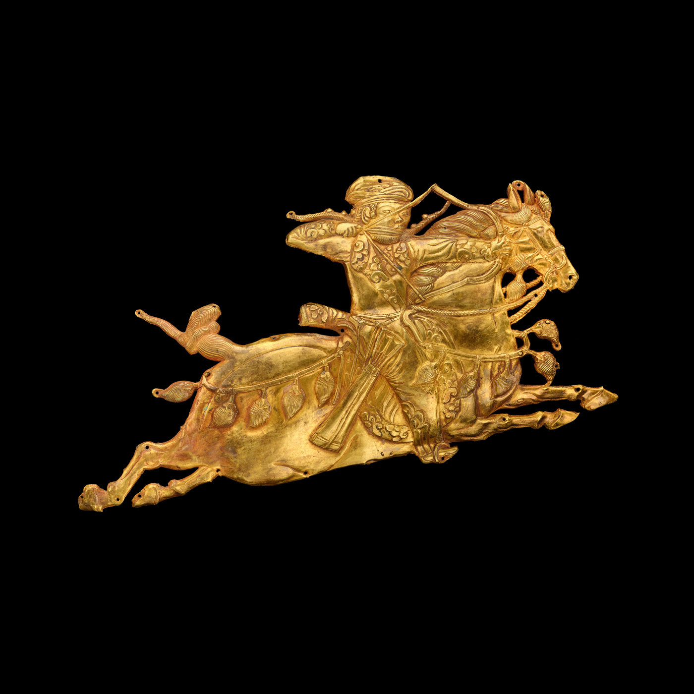 騎射武士形飾牌