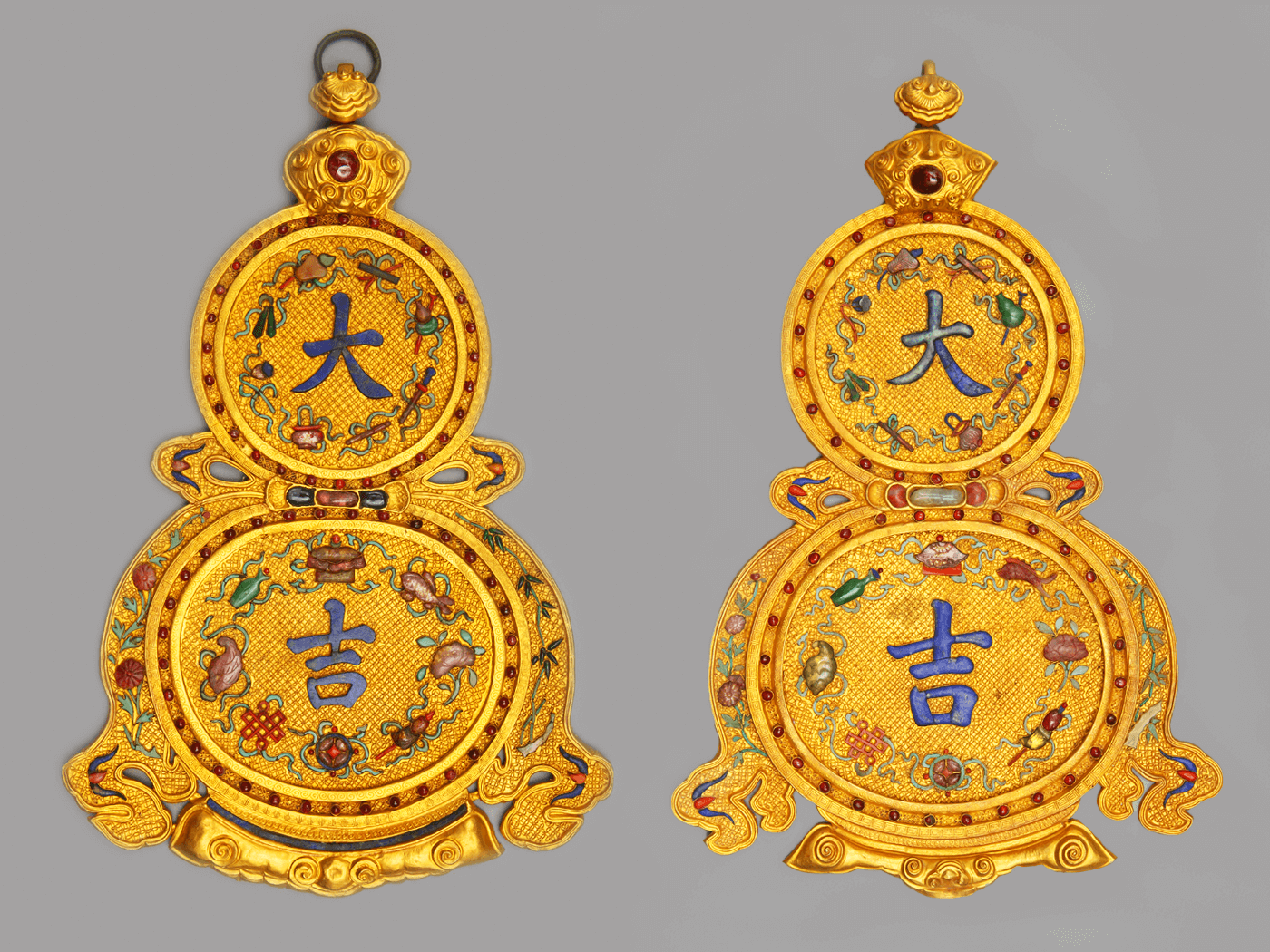 Two double gourd-shaped hangings with auspicious characters